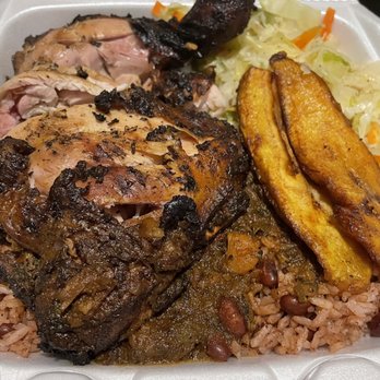 Bikkle Jamaican Restaurant - Jerk Chicken with oxtail curry, fried plantains, rice and beans, steamed cabbage and carrots. - Caribbean Near Me - Austin, Texas