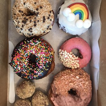PVDonuts - magic bar, Pride special, chocolate frosted sprinkles, flourless raspberry chip, wallabees donut holes, vegan roasted strawberry. - Donuts Near Me - Providence, Rhode Island