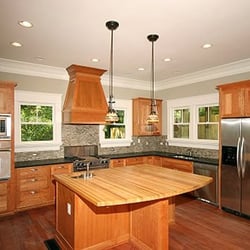 Sterling Works - Virginia Highlands kitchen Cherry cabinets, honed granite countertops, Maple butcher block island, Brazilian Cherry hardwood floors