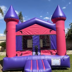 Pink and purple Castle bounce house. 

Size is 13x13