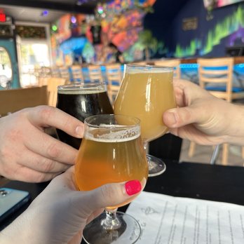 Mystic Ways Brewing - two people clinking glasses of beer - Brewpubs Near Me - Perkasie, Pennsylvania
