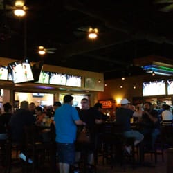SHENANYGANS - Main Bar area...Plenty of TV's