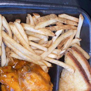 Slim Chickens - I had the 6 piece mango habanero wings. The sauce was really good the fries could of been more crispy. - Southern Near Me - Houston, Texas