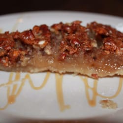 Main Street Steakhouse & Bar - One of their special award winning pecan pies . Not on the menu but can be preordered for events or special dinning occasions