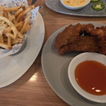 Earls Kitchen + Bar - Chicken tenders app and side of truffle frues - Canadian (New) Near Me - Mississauga, Ontario Earls Kitchen + Bar - Chicken tenders app and side of truffle frues - Canadian (New) Near Me - Mississauga, Ontario