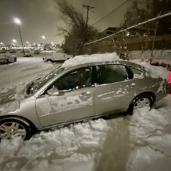 The Parking Spot 3 - It took 45 minutes to clear my car and get off the lot. Thankfully I had gloves and a scraper in my car.