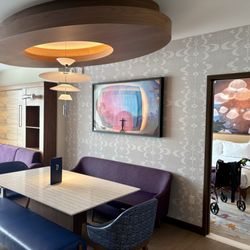 The Villa’s at Disneyland Hotel - Dining area and master bedroom entrance for ADA two bedroom Villa at Disneyland Hotel