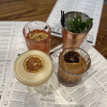 Dram And Draught - three cocktails on a menu - Bars Near Me - Winston-Salem, North Carolina