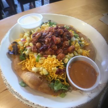 Tocabe An American Indian Eatery - Vegetarian Indian Taco with Sour Cream & Ancho Chipotle sauces on the side - American Near Me - Denver, Colorado Tocabe An American Indian Eatery - Vegetarian Indian Taco with Sour Cream & Ancho Chipotle sauces on the side - American Near Me - Denver, Colorado
