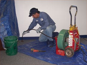 Slide of Suburban Sewer & Septic