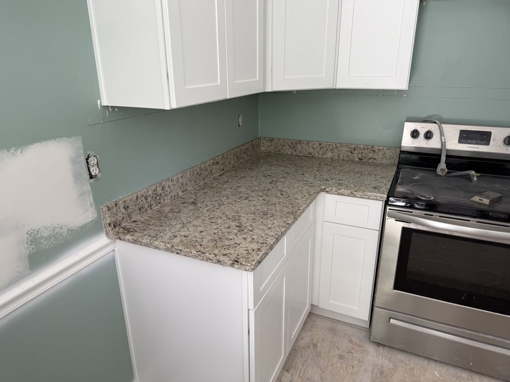 Slide of Hammerhead Roofing and Renovations