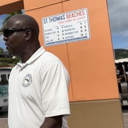 Virgin Islands Taxi Association - Very strict and cold angry guy who blames white people, as he stated so rudely!
