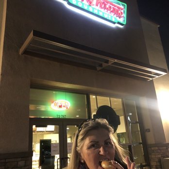 Krispy Kreme - Munching on a fresh, hot mini. Yum! - Donuts Near Me - Rancho Mirage, California Krispy Kreme - Munching on a fresh, hot mini. Yum! - Donuts Near Me - Rancho Mirage, California
