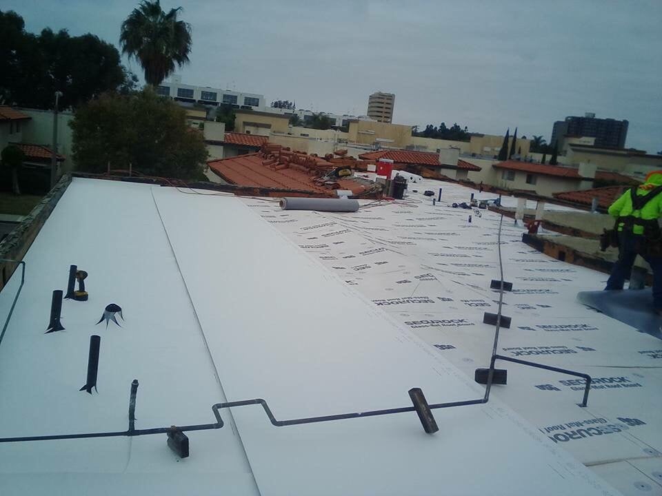 Slide of Tony and Velasco Roofing Constructions