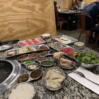 Let's Meat Kbbq - Most of this is the pre-main course fare. The two "long" trays are the appetizers! - Korean Near Me - Charlotte, North Carolina Let's Meat Kbbq - Most of this is the pre-main course fare. The two "long" trays are the appetizers! - Korean Near Me - Charlotte, North Carolina