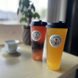 HaiCha - Passion fruit tea with lemon popping boba, Strawberry fruit tea w/brown sugar boba
