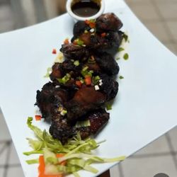 Wha Gwaan Jamaica Jamaica Restaurant and Lounge - Jerked Wings (grilled)