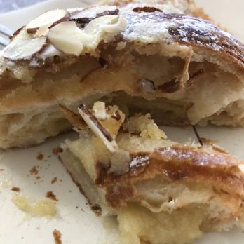 Le Cafe Du Val - A peek at all the delicious almond paste filling in their almond croissant - yummy! - Cafes Near Me - Henderson, Nevada