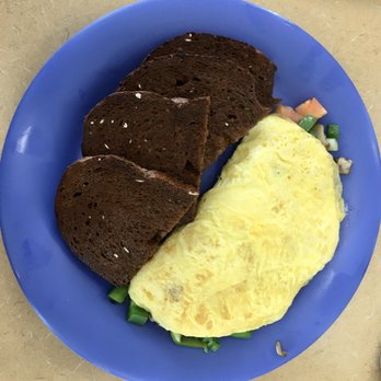 Real Food Cafe - Garden Omelet with dark rye toast - Breakfast & Brunch Near Me - Grand Rapids, Michigan