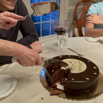 Chocolate Passion Pastry - Cutting into the beautiful cake! - Bakeries Near Me - Fairfax, Virginia
