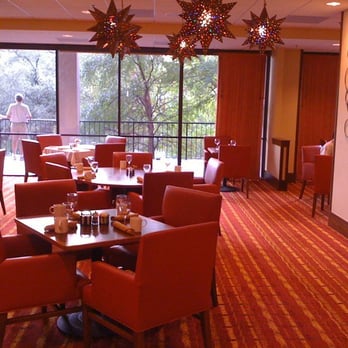 Cactus Flower Cafe - red chairs and tables in a restaurant - Tex-Mex Near Me - San Antonio, Texas Cactus Flower Cafe - red chairs and tables in a restaurant - Tex-Mex Near Me - San Antonio, Texas