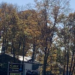 Cater Plumbing - Here is the large sign making it look like a business. To the right there is a tiny tiny sign saying private property, no turn arounds.