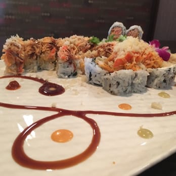 Sake Lounge - Volcano roll (front right), spicy crunchy crab roll (back right) and shaggy dog roll (left). - Japanese Near Me - Olathe, Kansas
