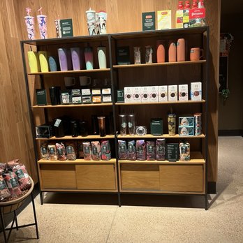 Starbucks - a coffee shop with a shelf full of coffee products - Coffee & Tea Near Me - Springtown, Texas