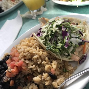 Wahoo's Fish Tacos - Fish tacos topped w/ coleslaw sides: black beans & brown rice - Mexican Near Me - Laguna Beach, California Wahoo's Fish Tacos - Fish tacos topped w/ coleslaw sides: black beans & brown rice - Mexican Near Me - Laguna Beach, California