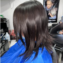 Fancy Wave Beauty Salon - Wispy short thick layers & perimeter