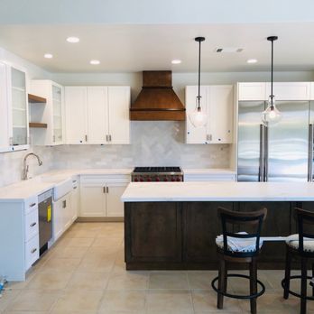 J J Tile and Marble - a kitchen with a center island - Tiling Near Me - Thermal, California J J Tile and Marble - a kitchen with a center island - Tiling Near Me - Thermal, California