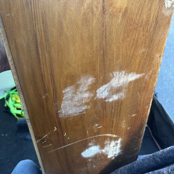 Dynasty Movers - White dresser put up agains wood furniture with no blanket. - Movers Near Me Dynasty Movers - White dresser put up agains wood furniture with no blanket. - Movers Near Me