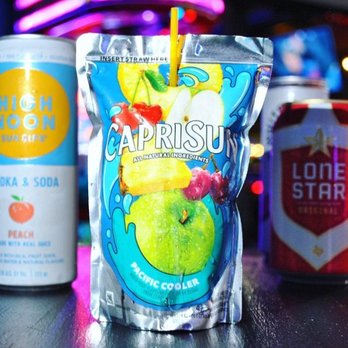 Barcadia - a can of caprisu and a can of soda - Bars Near Me - Dallas, Texas