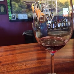 Tasting a red at the bar Tasting a red at the bar