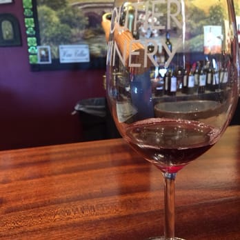 Boutier Winery - Tasting a red at the bar - Wineries Near Me - Danielsville, Georgia Boutier Winery - Tasting a red at the bar - Wineries Near Me - Danielsville, Georgia