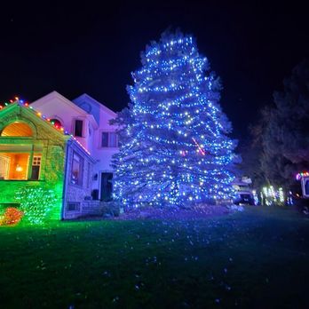 Clean & Green Property Care - Holiday lighting with tree wrapping and home accents. Professional installation that creates a magical display for the season. - Snow Removal Near Me - Deerfield, Illinois Clean & Green Property Care - Holiday lighting with tree wrapping and home accents. Professional installation that creates a magical display for the season. - Snow Removal Near Me - Deerfield, Illinois