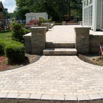 Todaro's Landscaping - a brick walkway with steps leading to a playground - General Contractors Near Me - Chesterfield, Michigan Todaro's Landscaping - a brick walkway with steps leading to a playground - General Contractors Near Me - Chesterfield, Michigan
