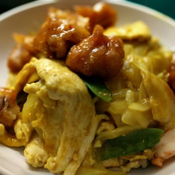 New China Restaurant - Three favorites, one bowl. General Tso's Chicken and Curry Chicken on top of Young Chow Fried Rice! - Chinese Near Me - Schenectady, New York