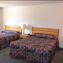 Regular room have 2 queens, a table & 2 chairs, full bath/shower, microwave, a 30inch tall refrigerator, complimentary coffee. Regular room have 2 queens, a table & 2 chairs, full bath/shower, microwave, a 30inch tall refrigerator, complimentary coffee.