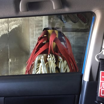 Chevron - the reflection of a woman's head in a rear view mirror - Gas Stations Near Me - Sun City, California Chevron - the reflection of a woman's head in a rear view mirror - Gas Stations Near Me - Sun City, California