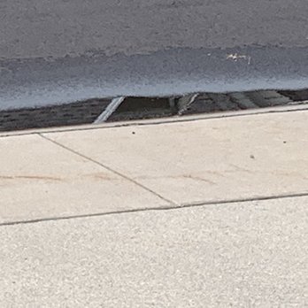 Hutch Paving - Rain water never flows to drain since Hutch's paving job in August 2021. - General Contractors Near Me - Warren, Michigan