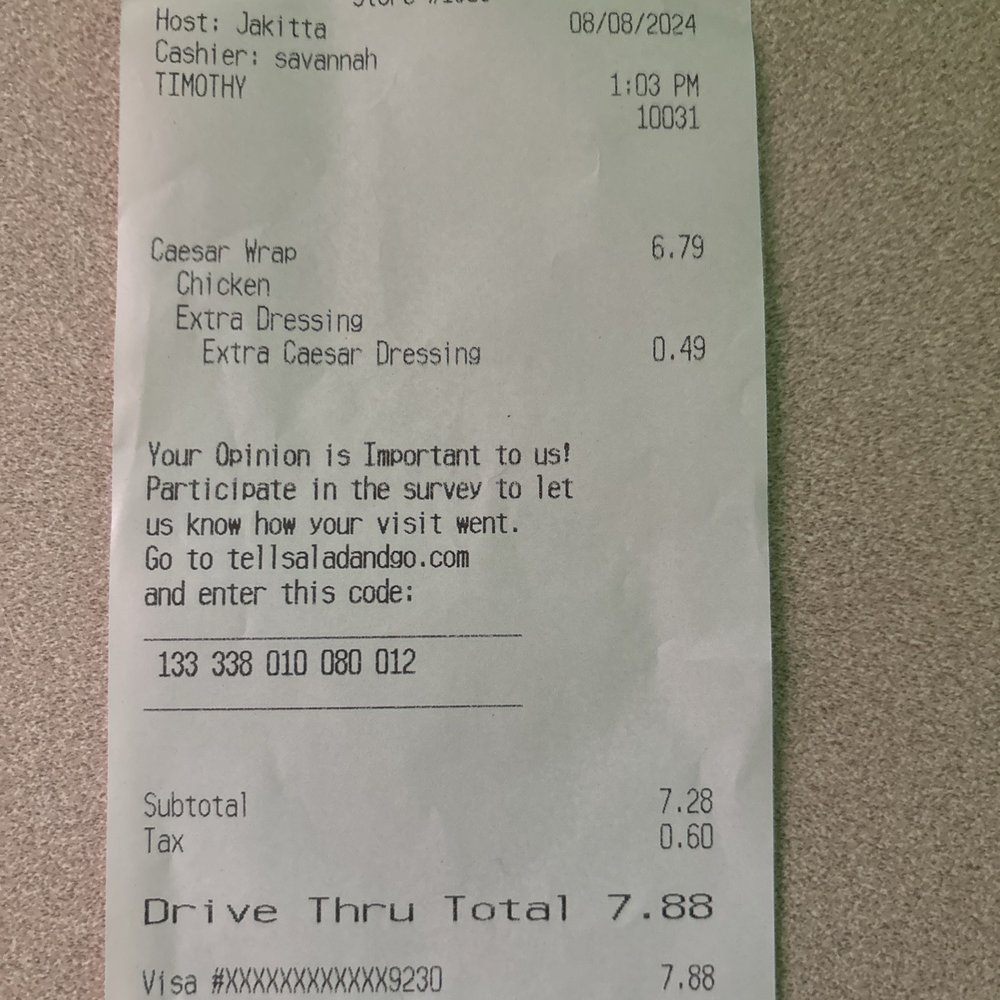 Chicken wrap with small charge for extra Caesar dressing. Chicken wrap with small charge for extra Caesar dressing.