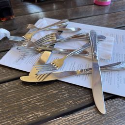 This is how they presented us with our flatware....dumped on the table in a random amount. This was for 3 people, btw.