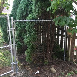5ft black chain link fence with a gate on each side. 5ft black chain link fence with a gate on each side.