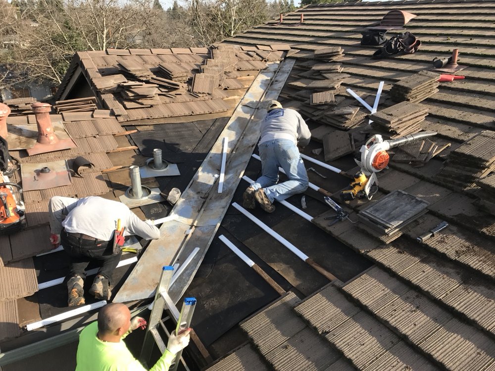 Slide of Academy Roofing