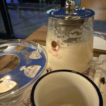 Qahwah House - Small pot of ginger milk. - Coffee & Tea Near Me - Columbus, Ohio Qahwah House - Small pot of ginger milk. - Coffee & Tea Near Me - Columbus, Ohio