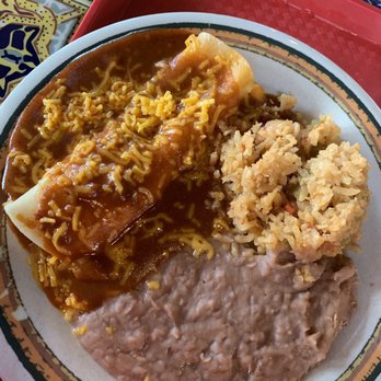 Photo of Rosa's Cafe & Tortilla Factory - Temecula, CA, United States. Enchilada rice and beans