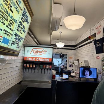 Fedoroffs Roast Pork - Counter with Goodfellas playing on the TV - Sandwiches Near Me - Brooklyn, New York