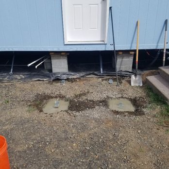 Blueline Construction & Handyman Service - Footings for the back steps. - General Contractors Near Me