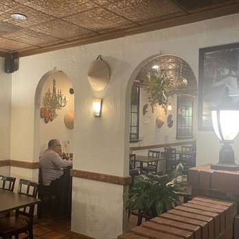 Miss Saigon - a man sitting at a table in a restaurant - Vietnamese Near Me - Freehold Township, New Jersey Miss Saigon - a man sitting at a table in a restaurant - Vietnamese Near Me - Freehold Township, New Jersey